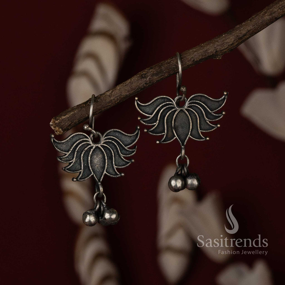 Boho chic lotus fish hook earrings in oxidised silver with hand-etched details and lightweight finish – a trendy fashion jewellery pick for women and girls – Sasitrends