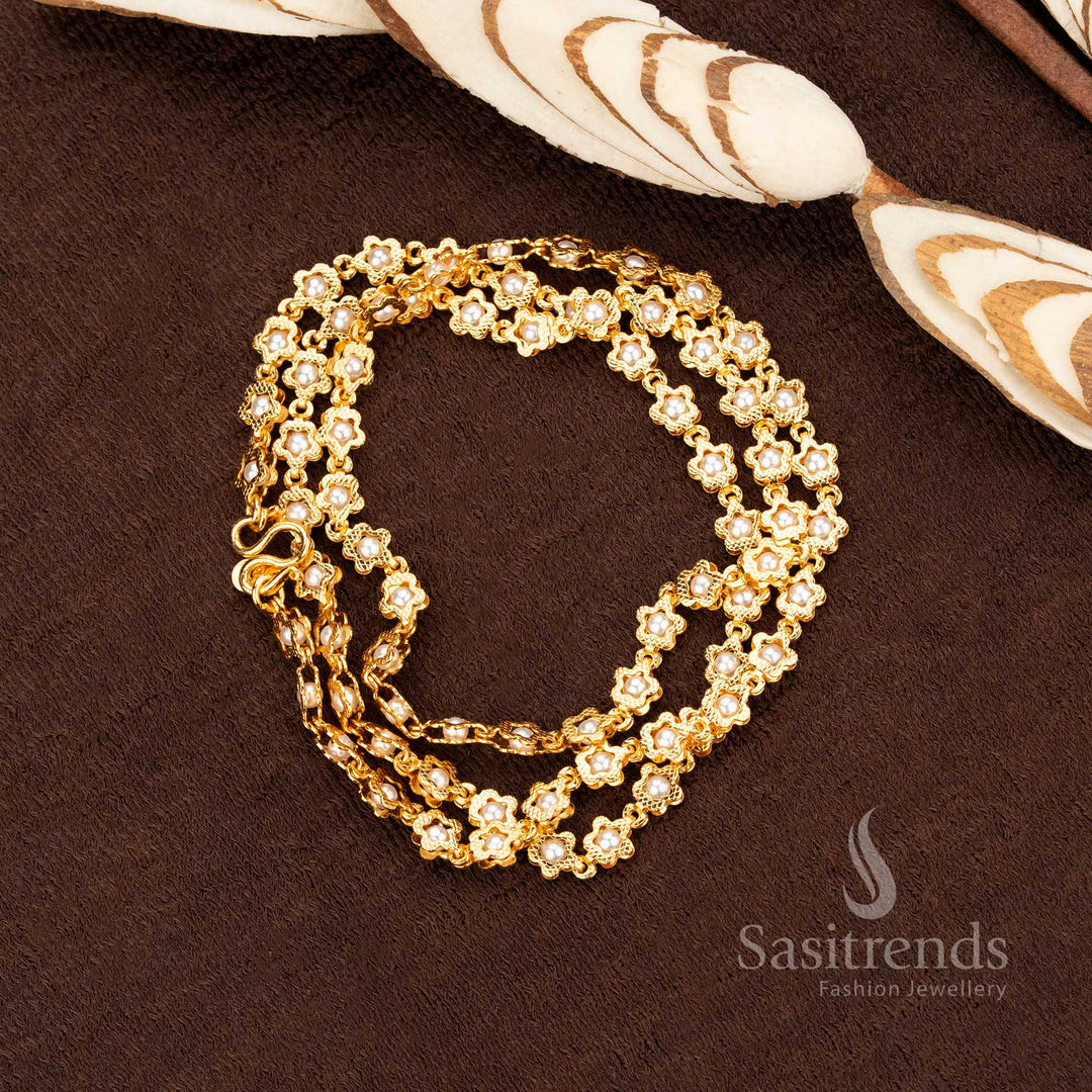 Graceful stringed pearl micro gold necklace with ornate floral connectors, offering a refined bridal touch. Ideal for ethnic functions and ceremonial jewellery wear – Sasitrends