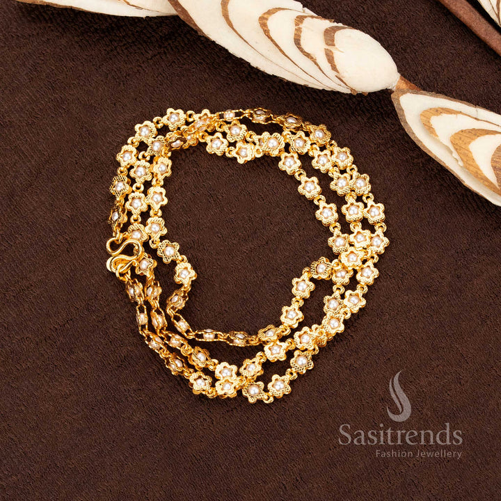Graceful stringed pearl micro gold necklace with ornate floral connectors, offering a refined bridal touch. Ideal for ethnic functions and ceremonial jewellery wear – Sasitrends
