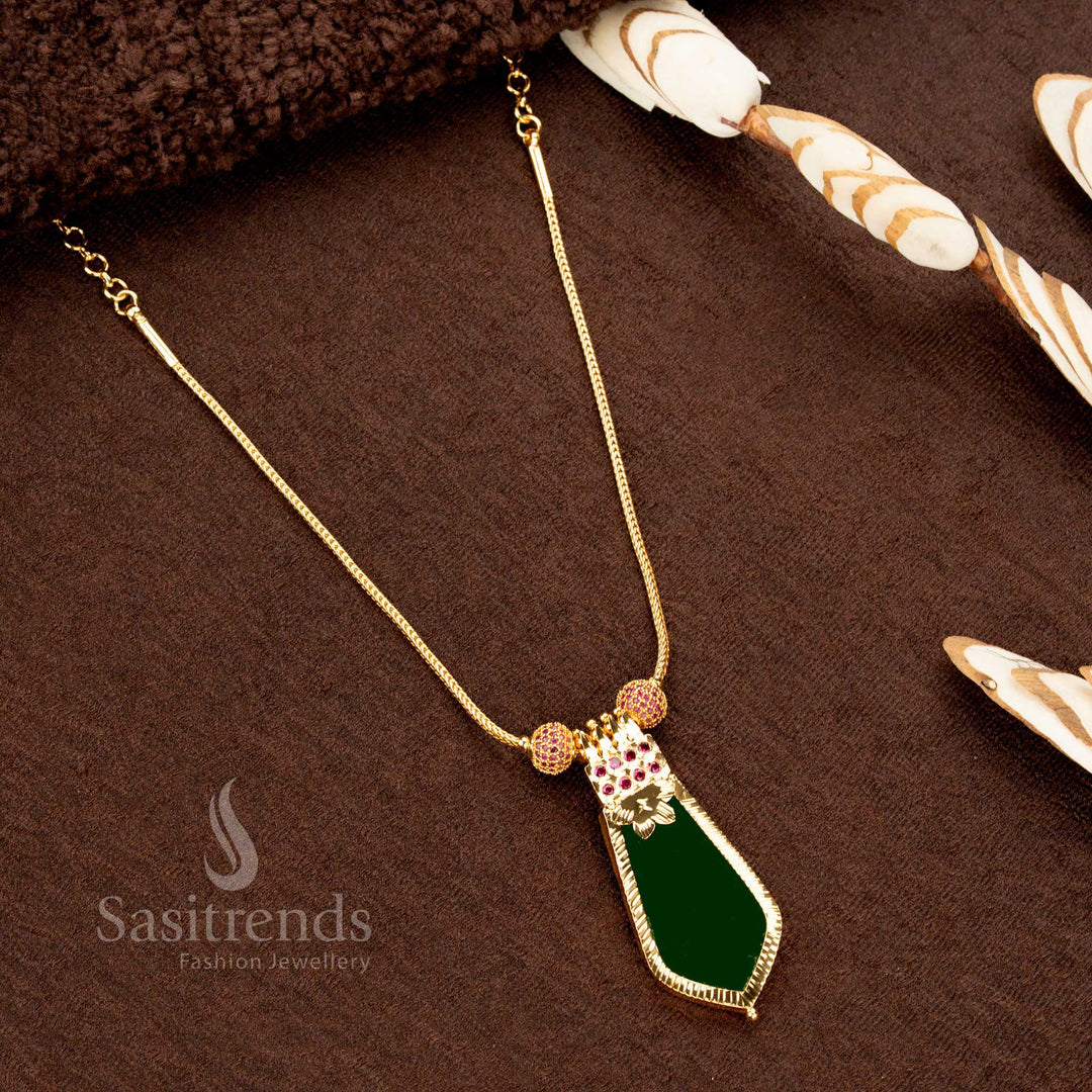 Elegant Kerala-style green Palakka Nagapadam pendant necklace with one gram gold plating, decorated with AD stones and a uniquely designed traditional chain - Sasitrends