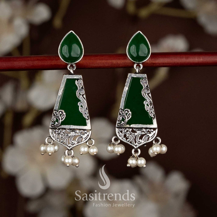 Graceful green oxidised teardrop stud trapezoid drop earrings symbolising festive freshness, perfect for Navaratri ethnic saree styling by Sasitrends