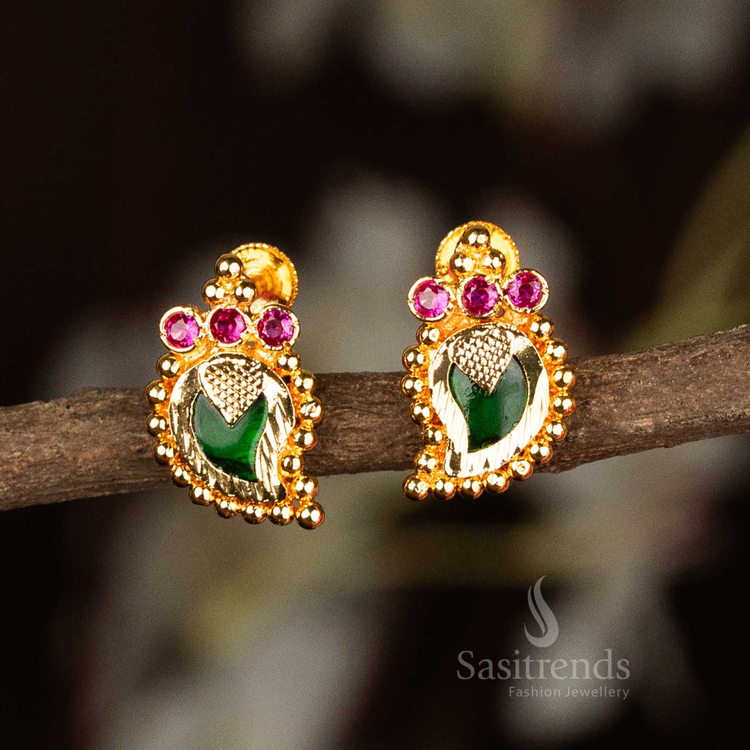 Ethnic green Palakka earrings with mango motifs and straight-set AD stones, polished in micro gold for a classic Kerala look – a graceful traditional jewellery style by Sasitrends