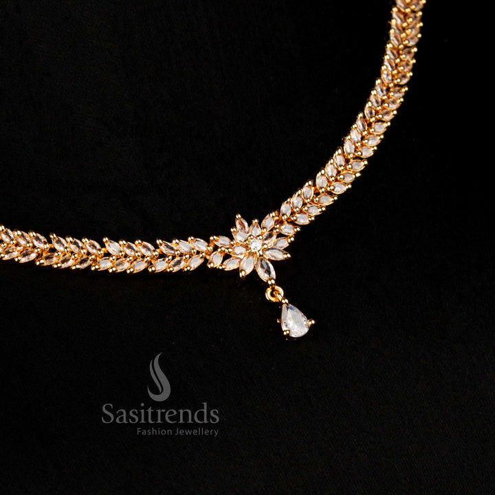 Micro gold plated American Diamond necklace set in radiant white, featuring intricate leaf cluster motifs and marquise stone floral vine detailing with a teardrop pendant for a regal wedding look – Sasitrends