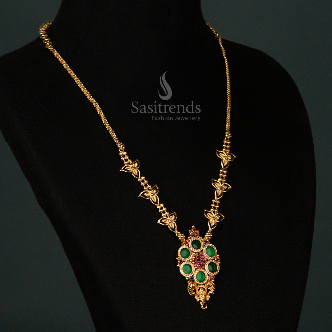 Resplendent Kerala-style micro gold plated Palakka necklace in rich ruby-green hues, featuring an intricately crafted Vinayagar motif, a lustrous round pendant - Sasitrends