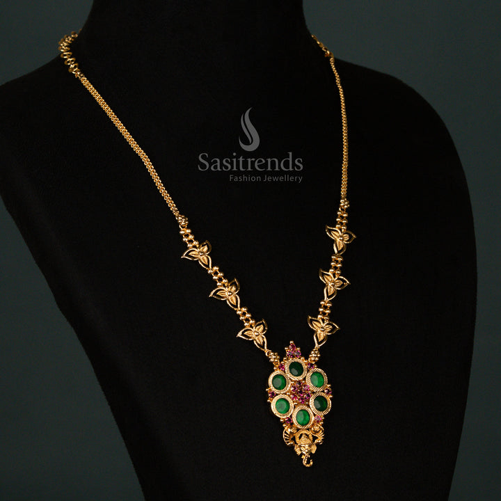Resplendent Kerala-style micro gold plated Palakka necklace in rich ruby-green hues, featuring an intricately crafted Vinayagar motif, a lustrous round pendant - Sasitrends