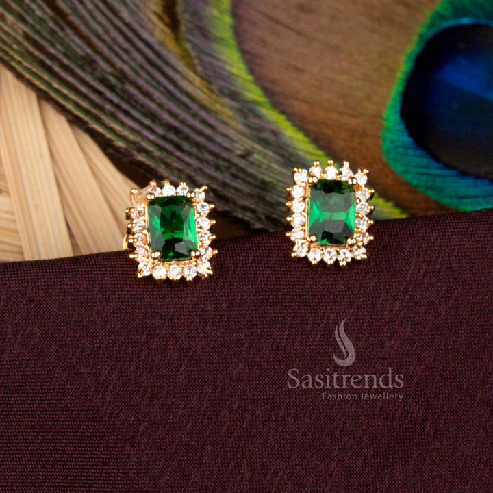Radiant pair of micro gold plated AD rectangular stud earrings designed with lush green artistry in 24 carat pure gold style, ideal for temple ceremonies, cultural weddings, and evening festivities - Sasitrends