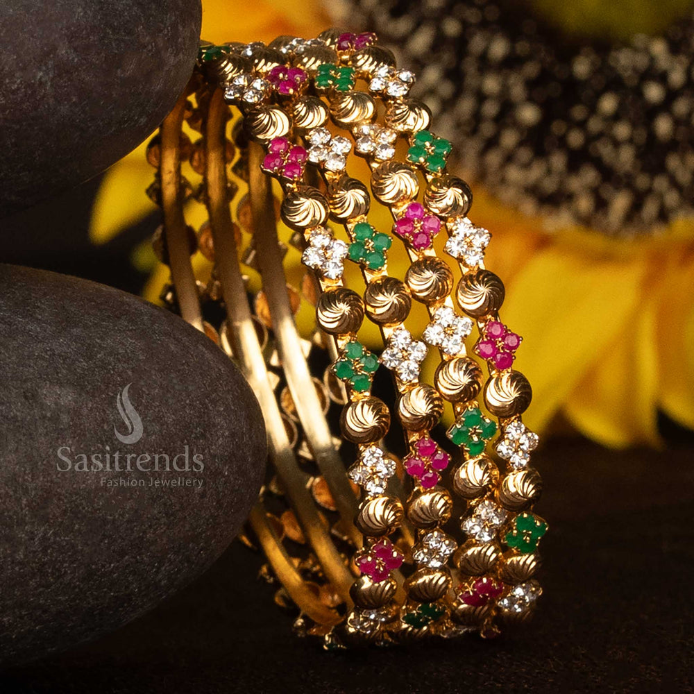 Vibrant multi-colour stone pattern spiral bangles with micro gold plating, featuring a rich one gram finish – classic festive jewellery designed to resemble real gold, ideal for saree wear – Sasitrends