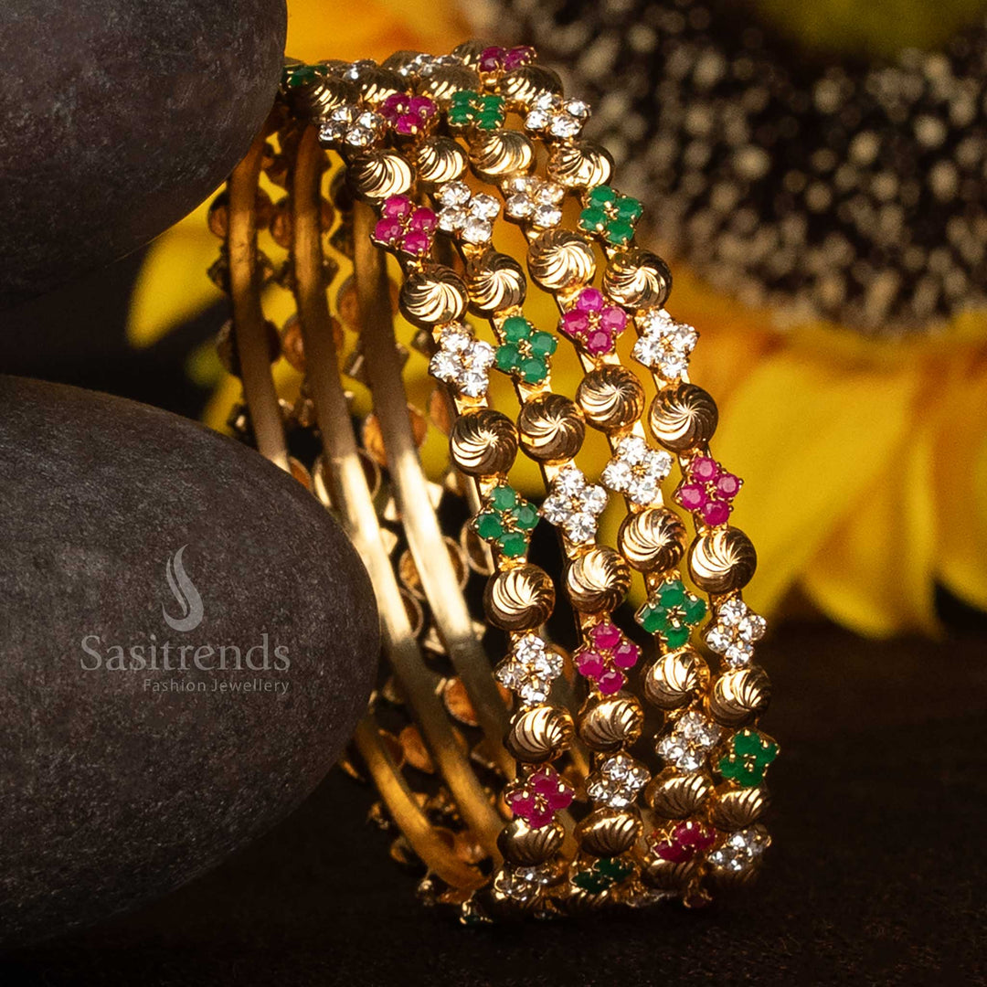 Vibrant multi-colour stone pattern spiral bangles with micro gold plating, featuring a rich one gram finish – classic festive jewellery designed to resemble real gold, ideal for saree wear – Sasitrends