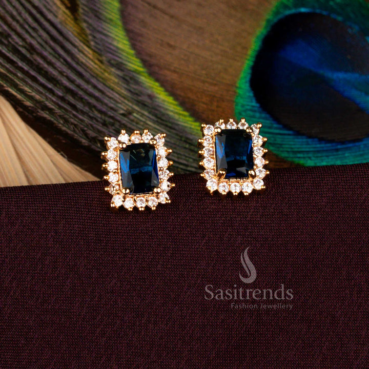 Opulent rectangular AD stud earrings in dazzling sapphire blue framed in micro gold plated one gram artistry with 24 carat brilliance, perfect for grand receptions, traditional festivities, and temple adornment - Sasitrends