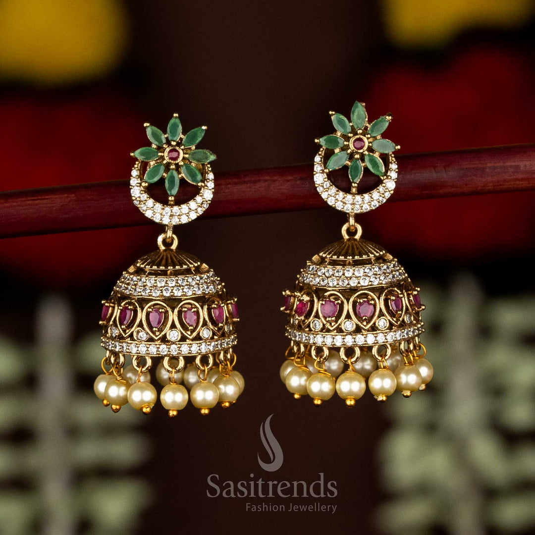 Radiant matte gold plated multi AD floral crescent dome jhumka earrings with pearl drops – Sasitrends