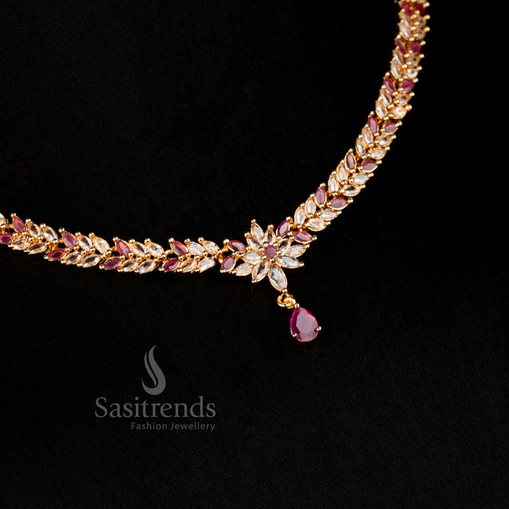 Micro gold American Diamond necklace jewellery set in enchanting white–ruby dual tones, adorned with leaf cluster marquise stones and a floral vine design, finished with a shimmering teardrop pendant – Sasitrends