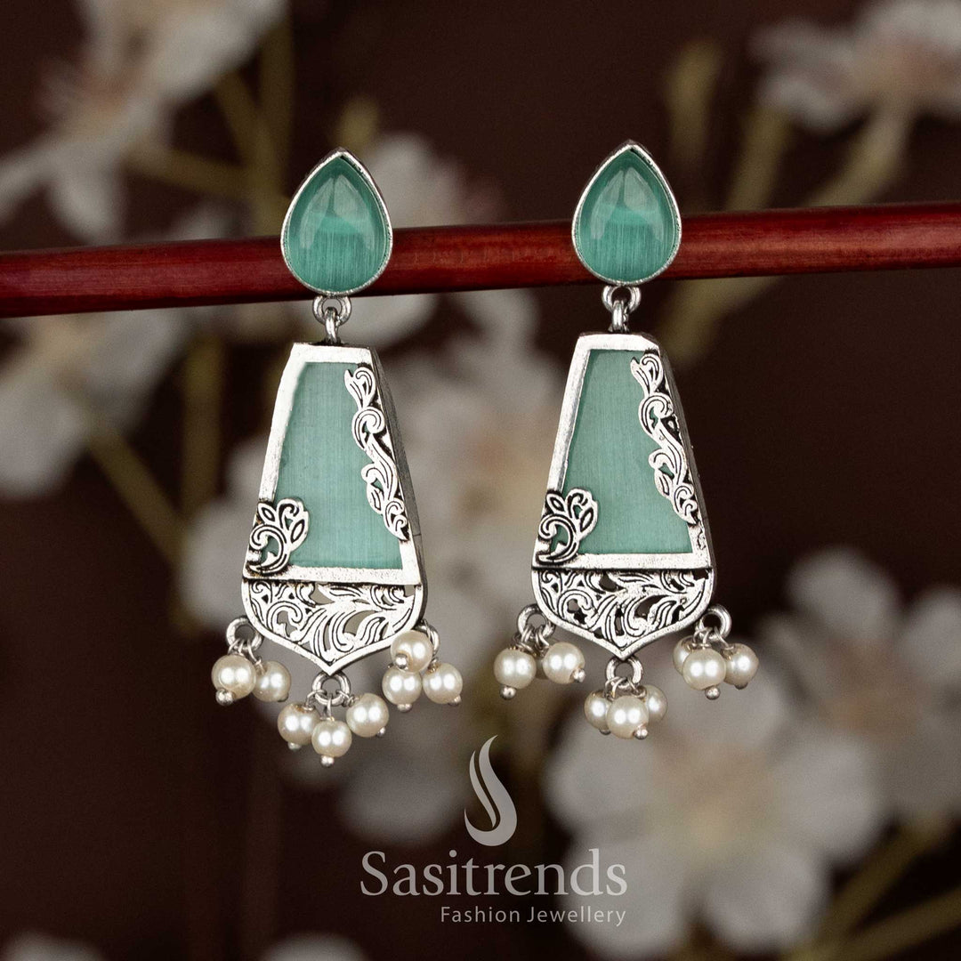 Refined mint oxidised trapezoid drop earrings with teardrop stud tops, ideal for festive saree fashion and ethnic styling by Sasitrends