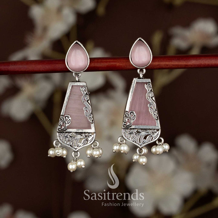 Charming pink oxidised trapezoid drop earrings with teardrop tops, perfect for Navaratri celebrations and ethnic gatherings by Sasitrends