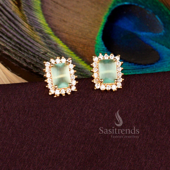 Elegant stud earrings enriched with fresh mint gemstone sparkle and plated in micro gold for a regal 24 carat gold aura, designed for sangeet nights, festive rituals, and traditional wedding occasions - Sasitrends