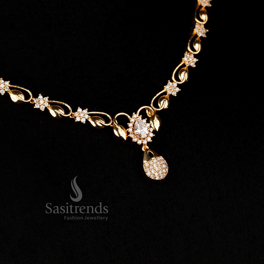 Elegant ivory micro gold AD teardrop pendant necklace adorned with white stones, perfect for a classic bridal statement and refined festive wear – Sasitrends