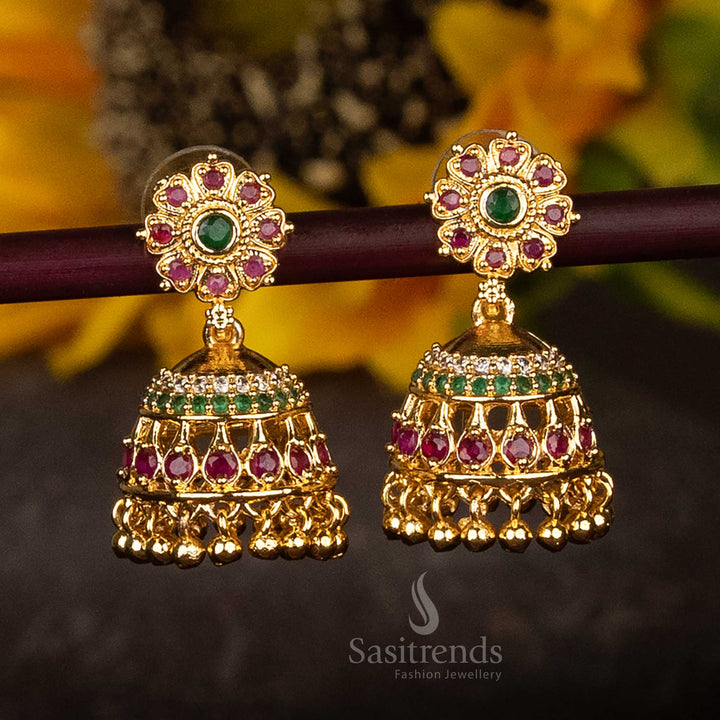 Elegant multi-tone AD stone jhumka earrings with micro gold plated floral design and beaded pearl hangings – timeless traditional jewellery for festive and ethnic attire – Sasitrends