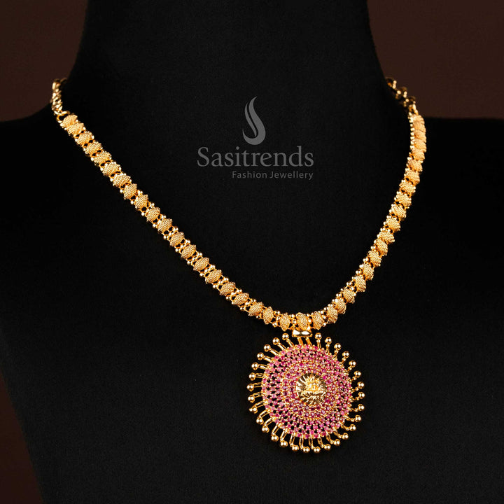 Temple-inspired pendant necklace crafted in one gram micro gold with a radiant Lakshmi motif and sunburst ruby stones, ideal for religious ceremonies and classic Indian traditional jewellery – sacred elegance from Sasitrends