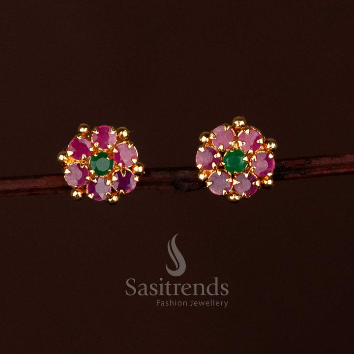 Stunning ruby-green one gram micro gold plated floral designer earrings with AD stones, designed for festive and traditional ethnic ensembles by Sasitrends