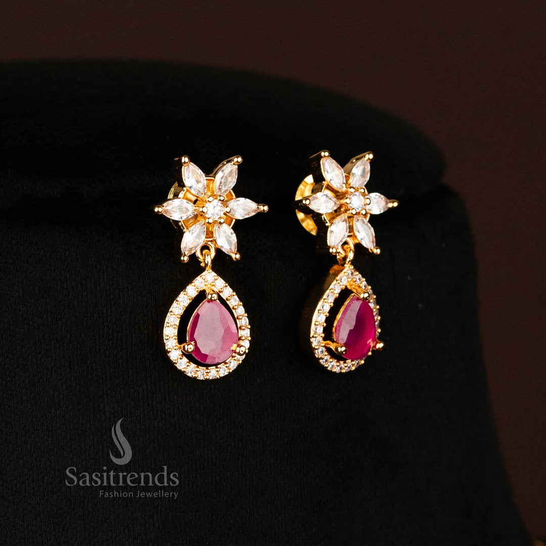 Graceful micro gold earrings with American diamonds in white and ruby tones, adorned with floral carvings, perfect ethnic wear from sasitrends
