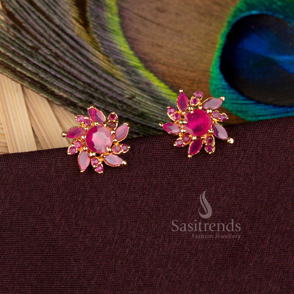 Splendid ruby floral AD stud earrings in one gram micro gold plated setting radiating a 24 carat pure gold aura ideal for bridal receptions, wedding ceremonies, and festive occasions - Sasitrends