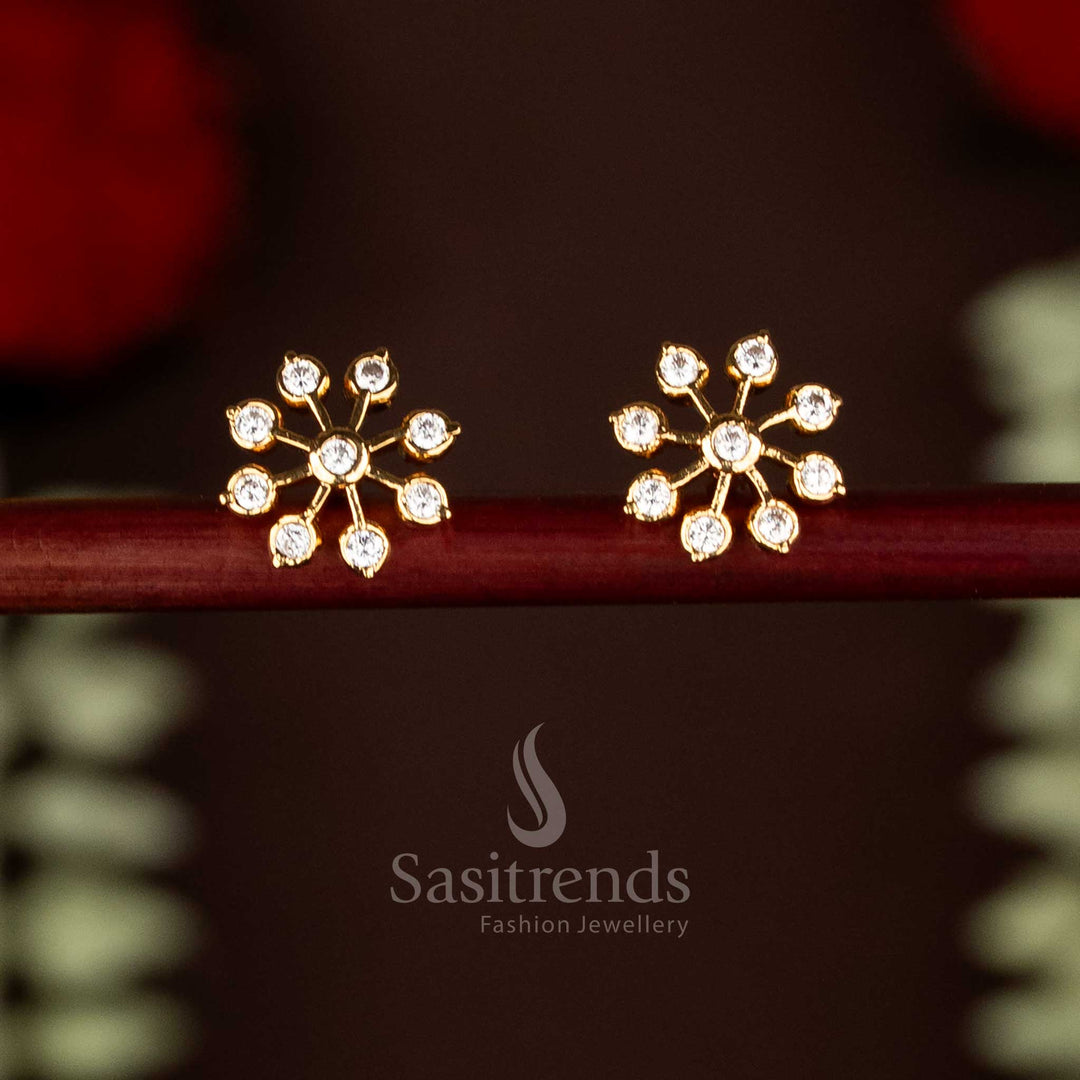 Exquisite white Impon Addigai one gram micro gold plated AD stone snowflake motif stud earrings, perfect for traditional saree wear and festive occasions by Sasitrends.