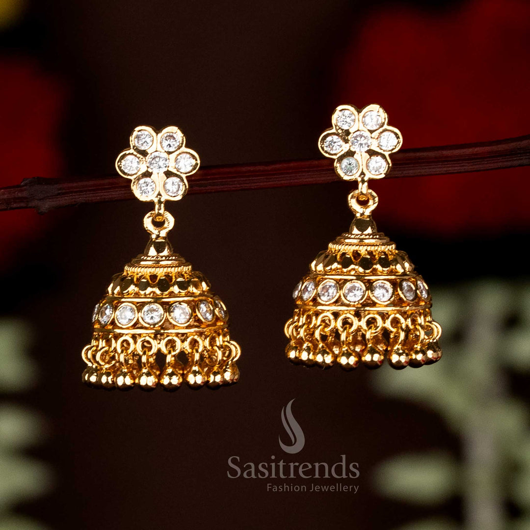 Elegant white Impon Addigai micro gold plated floral screw jhumka earrings, designed for traditional festive celebrations and enhancing saree wear with delicate charm by Sasitrends