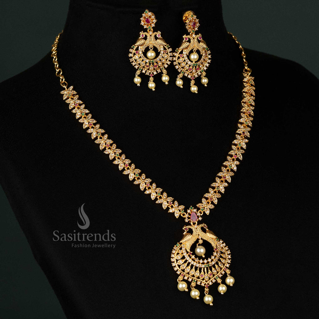 Gold plated AD jewellery set featuring floral motif chain, detailed twin peacock pendant, and matching earrings, look like real gold - Sasitrends