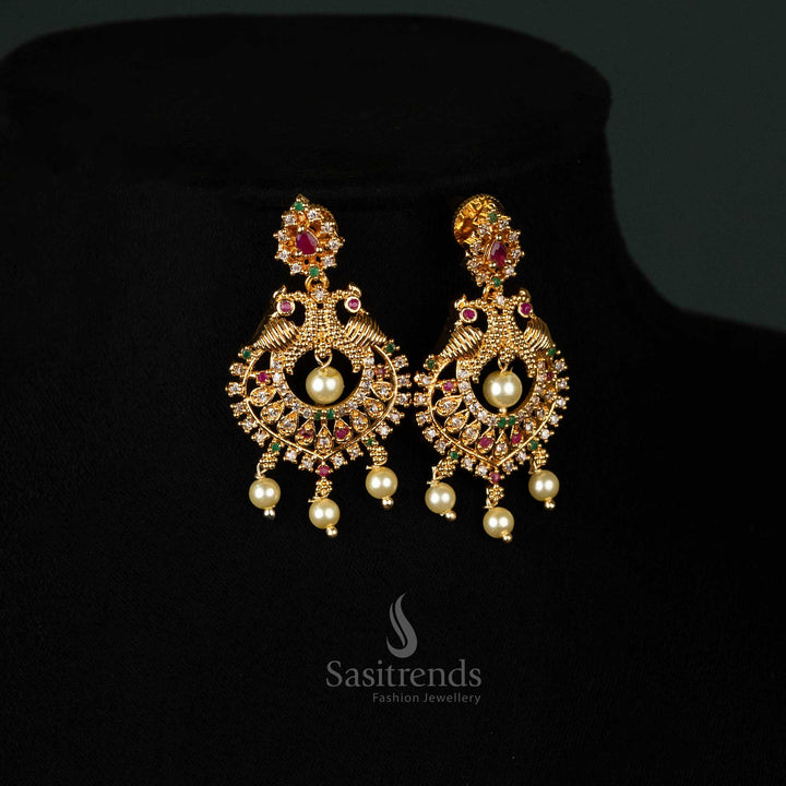 Traditional gold plated AD jewellery set featuring floral chain patterns, intricate pendant work, and pearl drops, look like real gold - Sasitrends