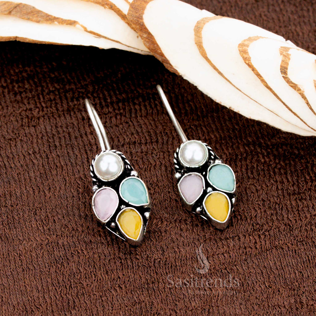 Oxidised silver fish hook earrings for office wear featuring pearl and colourful AD stone drops—a versatile jewellery piece that transitions effortlessly from day-to-evening wear with artistic charm - Sasitrends