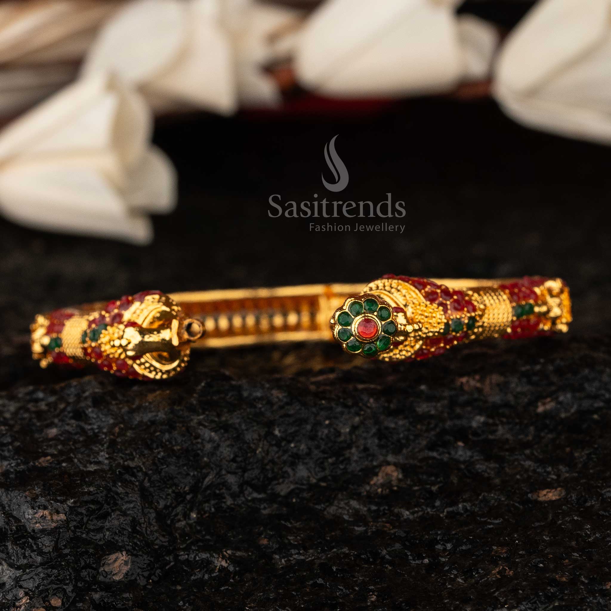 Luxurious high gold-finish Peacock Lakshmi openable Kada bangle, adorned with ruby-green stones, an exquisite heritage traditional jewellery piece for women - Sasitrends
