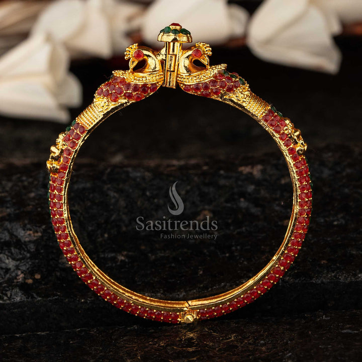 Elegant micro gold-finish Peacock Lakshmi Kada bangle, meticulously handcrafted with ruby-green stones - Sasitrends