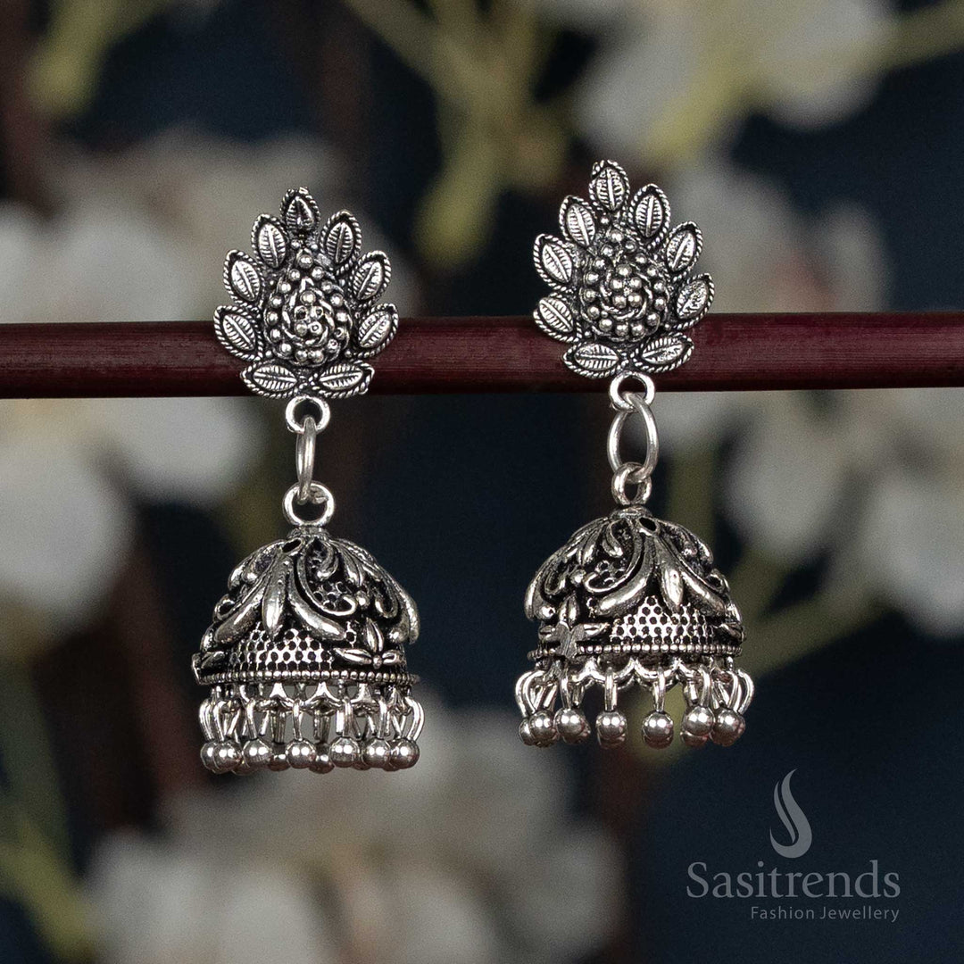 Floral stud earrings with dome and oxidised finish 