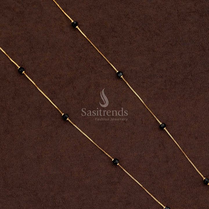 Delicate gold chain jewellery with small black bead accents.-Sasitrends