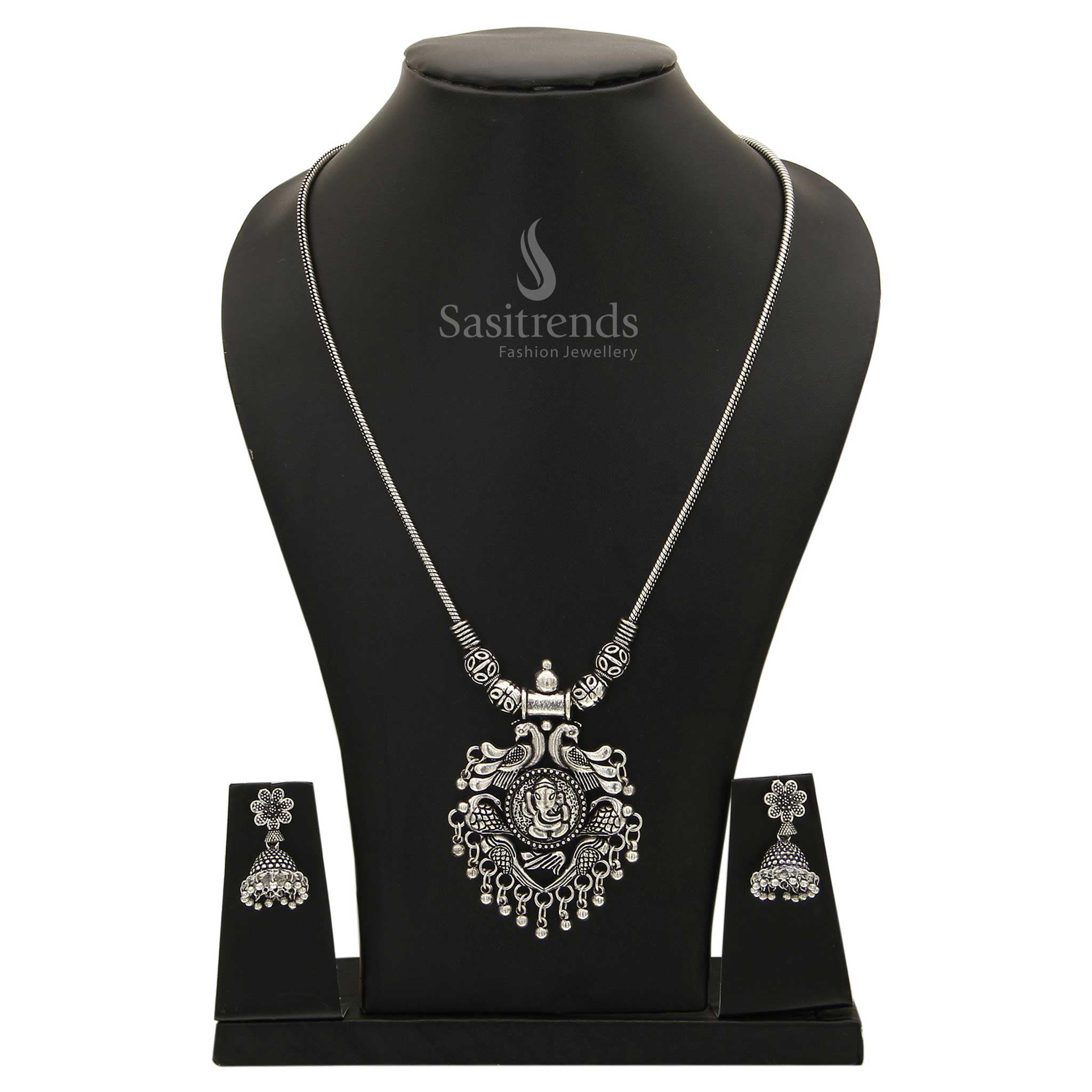 Ethereal oxidised silver Jhumka with necklace jewellery set adorned with goddess tales, temple motifs and vintage refinement - Sasitrends