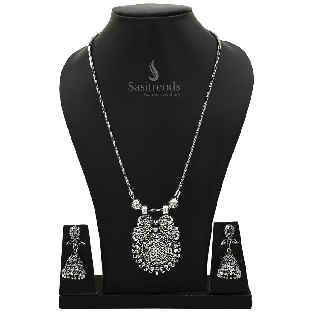 Majestic Mayurika Peacock Design Oxidised Silver and Antique Gold Pendant with Jhumka Earrings Combo – Traditional Fusion Style Jewellery Set for Sarees and Ethnic Wear by Sasitrends