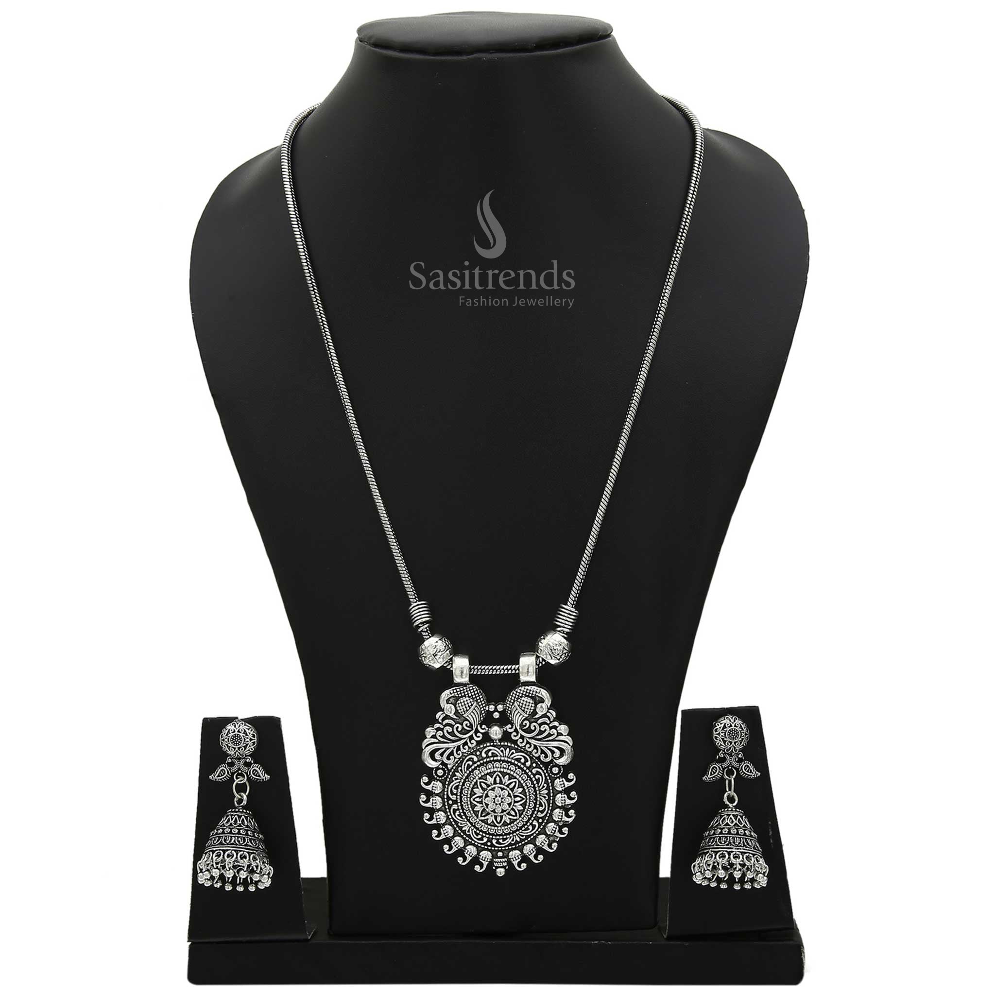 Majestic Mayurika Peacock Design Oxidised Silver and Antique Gold Pendant with Jhumka Earrings Combo – Traditional Fusion Style Jewellery Set for Sarees and Ethnic Wear by Sasitrends