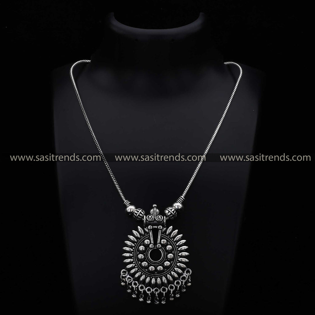 Ethnic oxidised necklace with sunburst pattern pendant and spherical beads navarathiri wear - Sasitrends