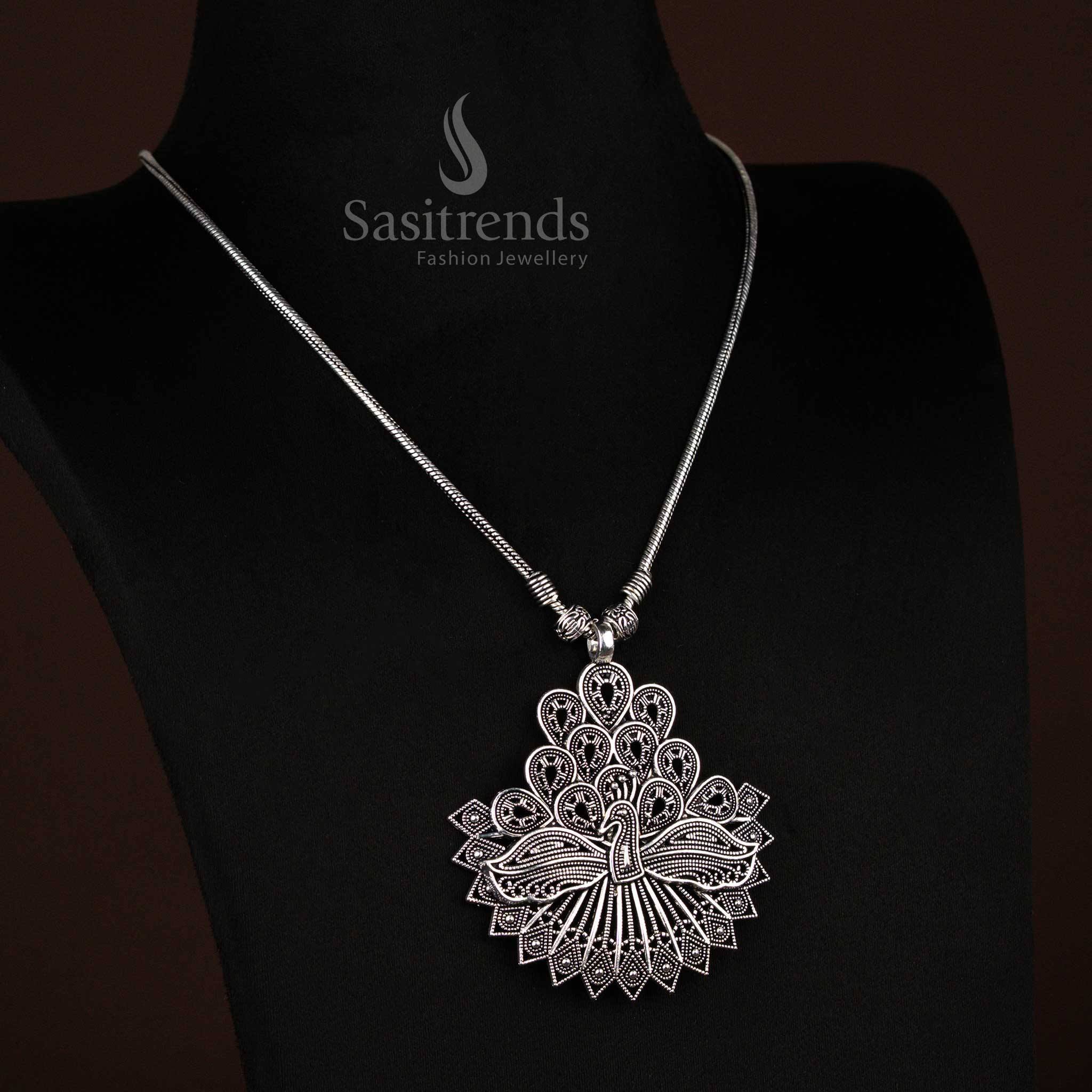 Heritage oxidised silver necklace with peacock motif and detailed feather pendant, an artisan handcrafted tribal jewellery design – Sasitrends