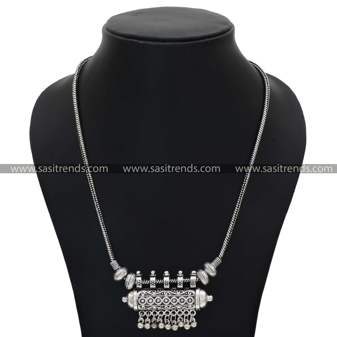 Classic oxidised silver necklace featuring a detailed floral motif and hanging beads - Sasitrends