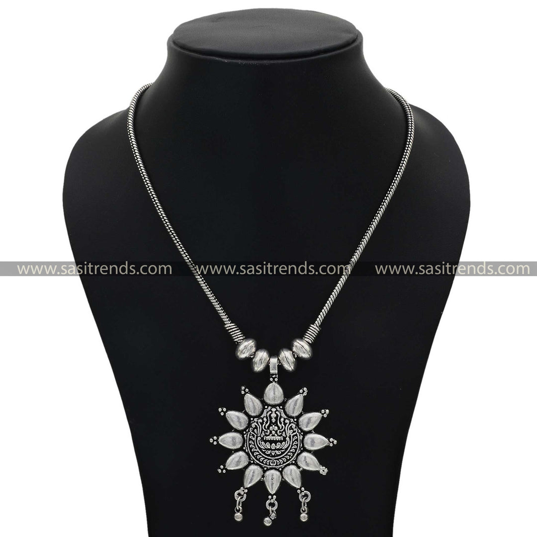 Elegant silver necklace featuring a central Lakshmi motif with petal-like adornments - Sasitrends