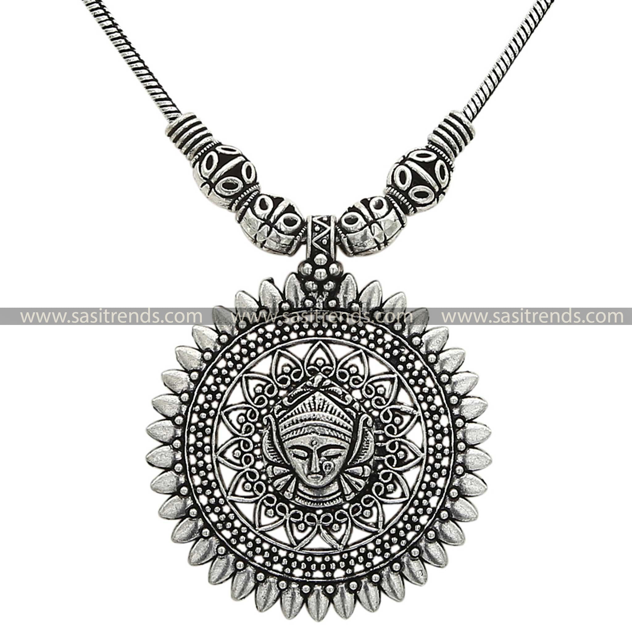 Oxidised necklace with engraved tribal face pendant and leaf border – Sasitrends