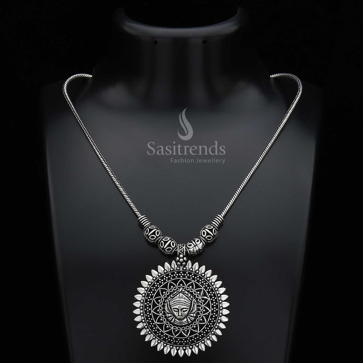 Traditional Oxidised Silver Chain Necklace Featuring Antique Round Pendant with Tribal Face Motif and Leaf-Inspired Border – Festive and Saree Wear Jewellery - Sasitrends