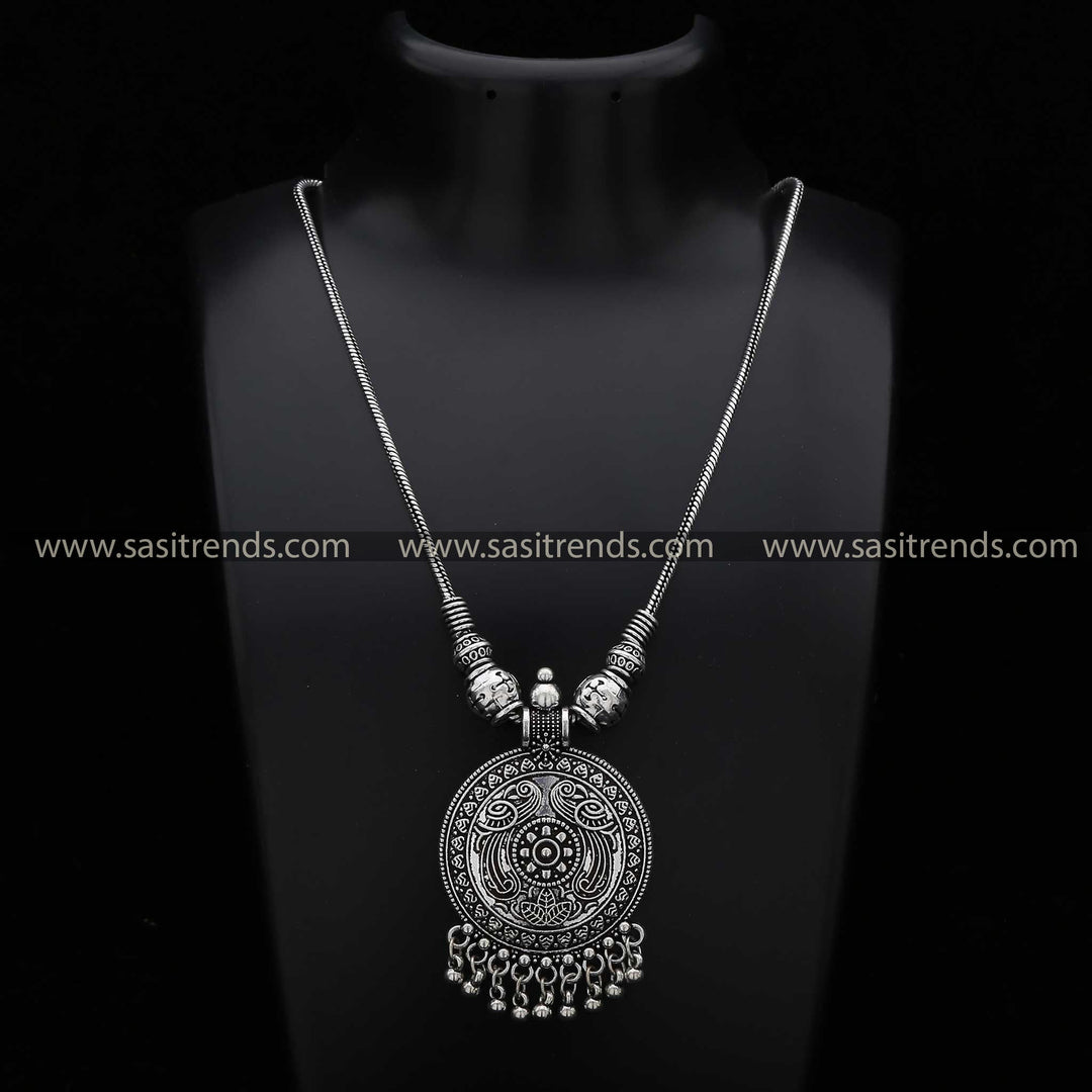Oxidised silver necklace with peacock motifs and circular pendant sasitrends navarathiri special