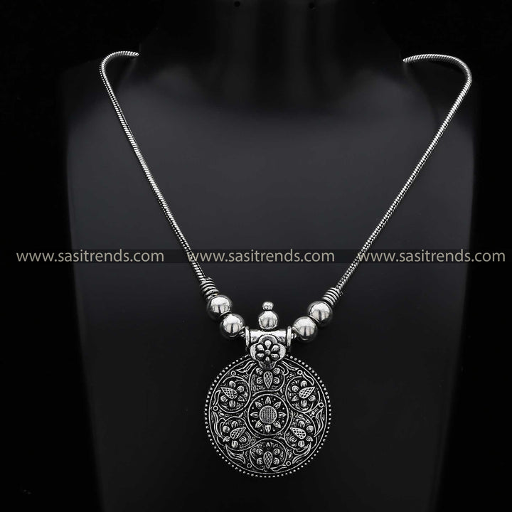 Latest oxidised silver necklace with ornate floral mandala pendant navarathiri jewellery - Sasitrends