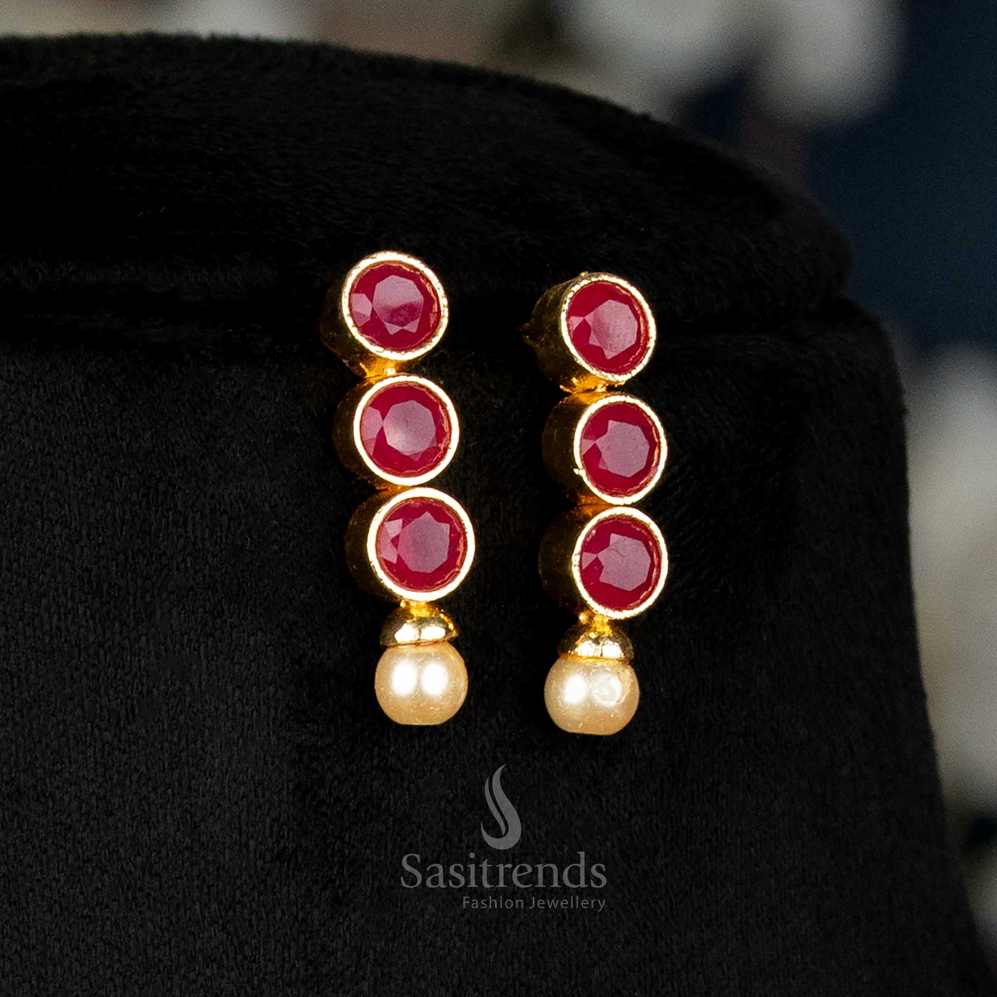 Radiant American Diamond Pearl Earrings Set Highlighted With Ruby Stone Accents And Ornate Pearl Hangings, A Captivating Choice For Grand Traditional Looks – Sasitrends