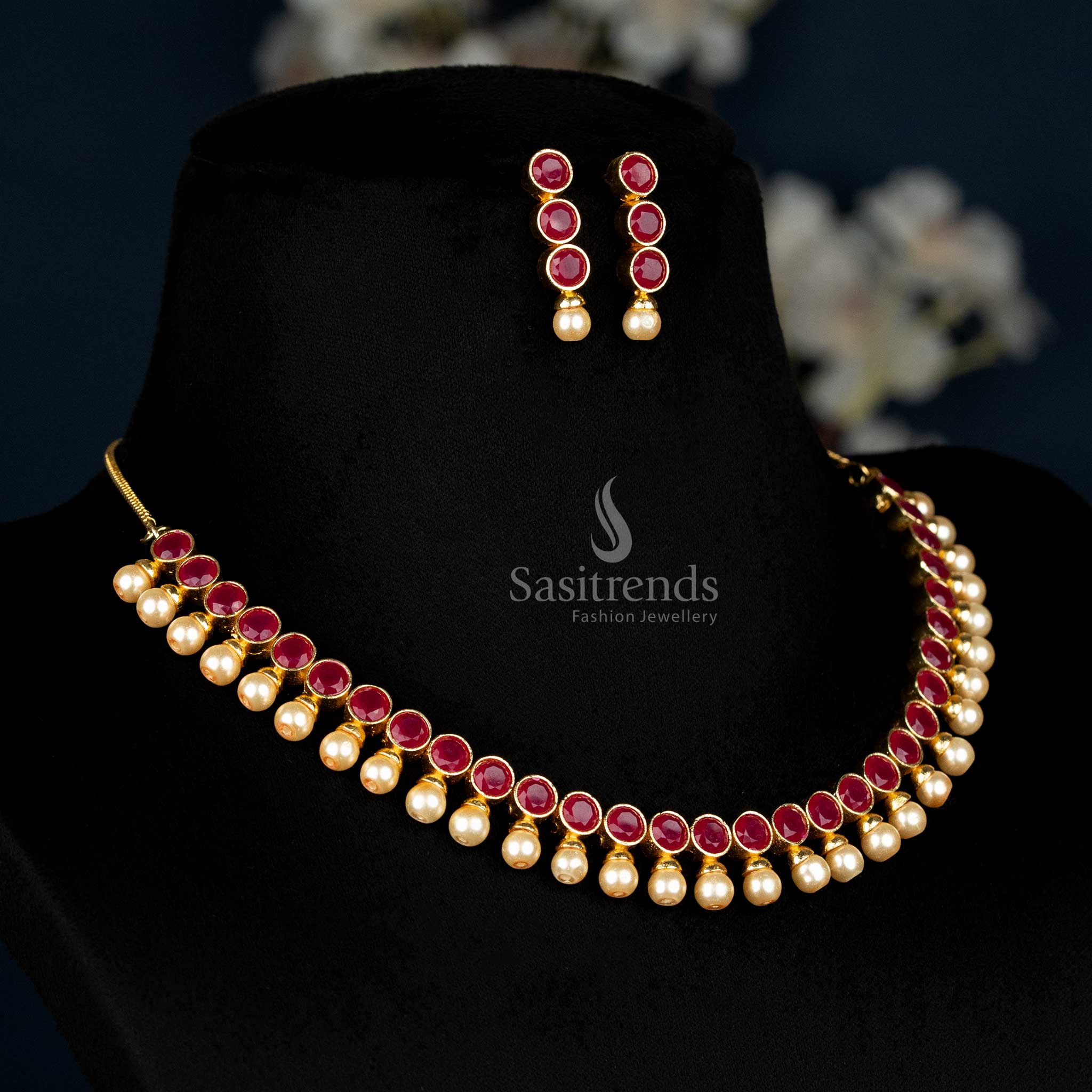 Graceful ruby-red necklace featuring brilliant AD stones, delicate pearl dangles and rich gold polish – perfect for ethnic gatherings and timeless charm – Sasitrends