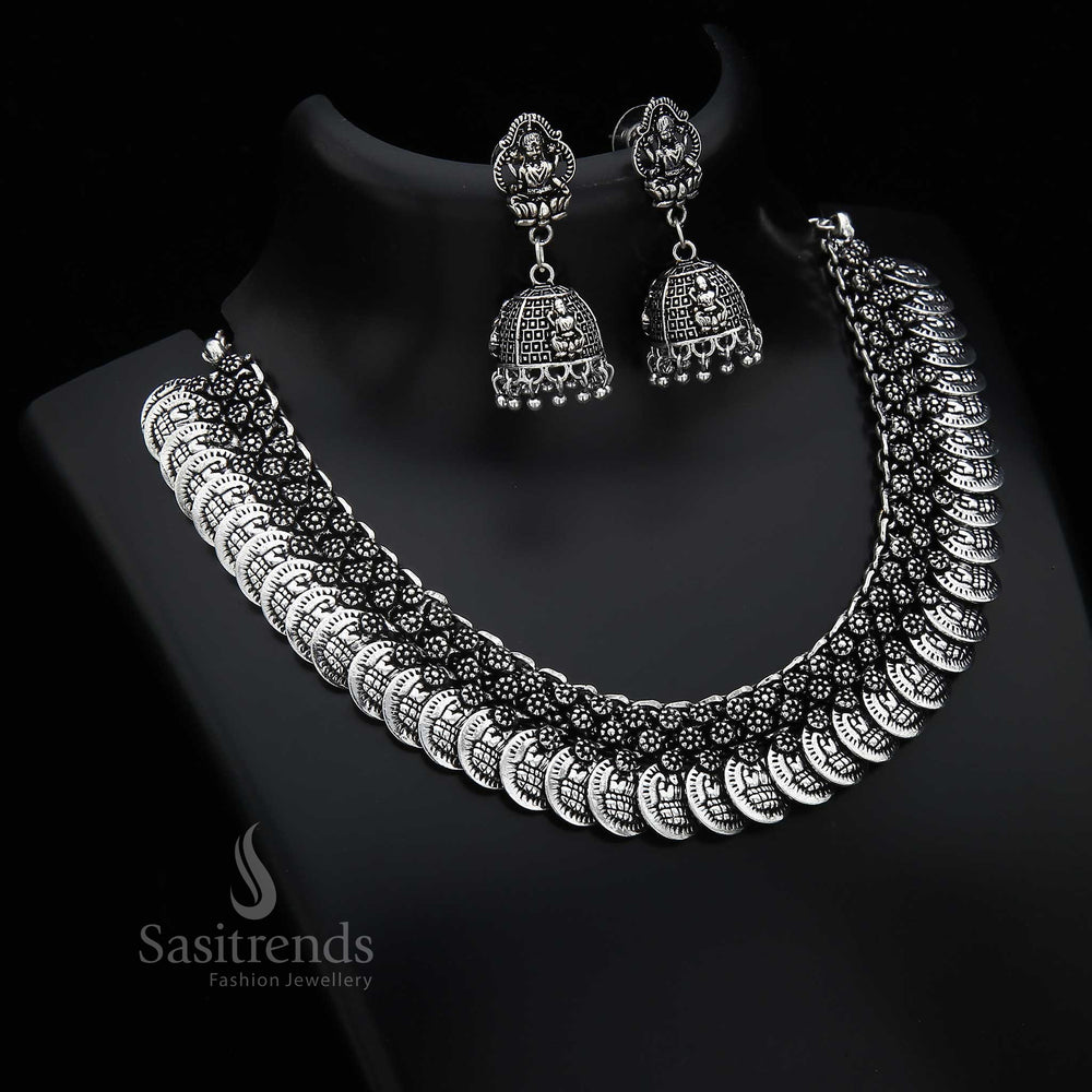 Divine oxidised silver Lakshmi coin Jhumka jewellery set with traditional elegance and vintage goddess engravings in royal antique finish - Sasitrends