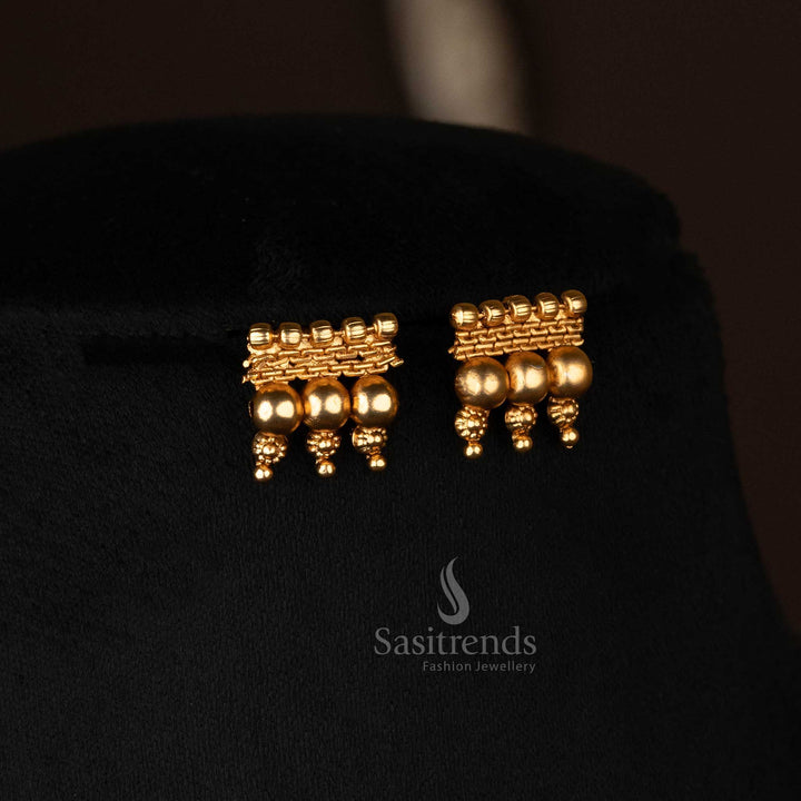Temple-style engraved design on matte gold-plated Earrings - Sasitrends