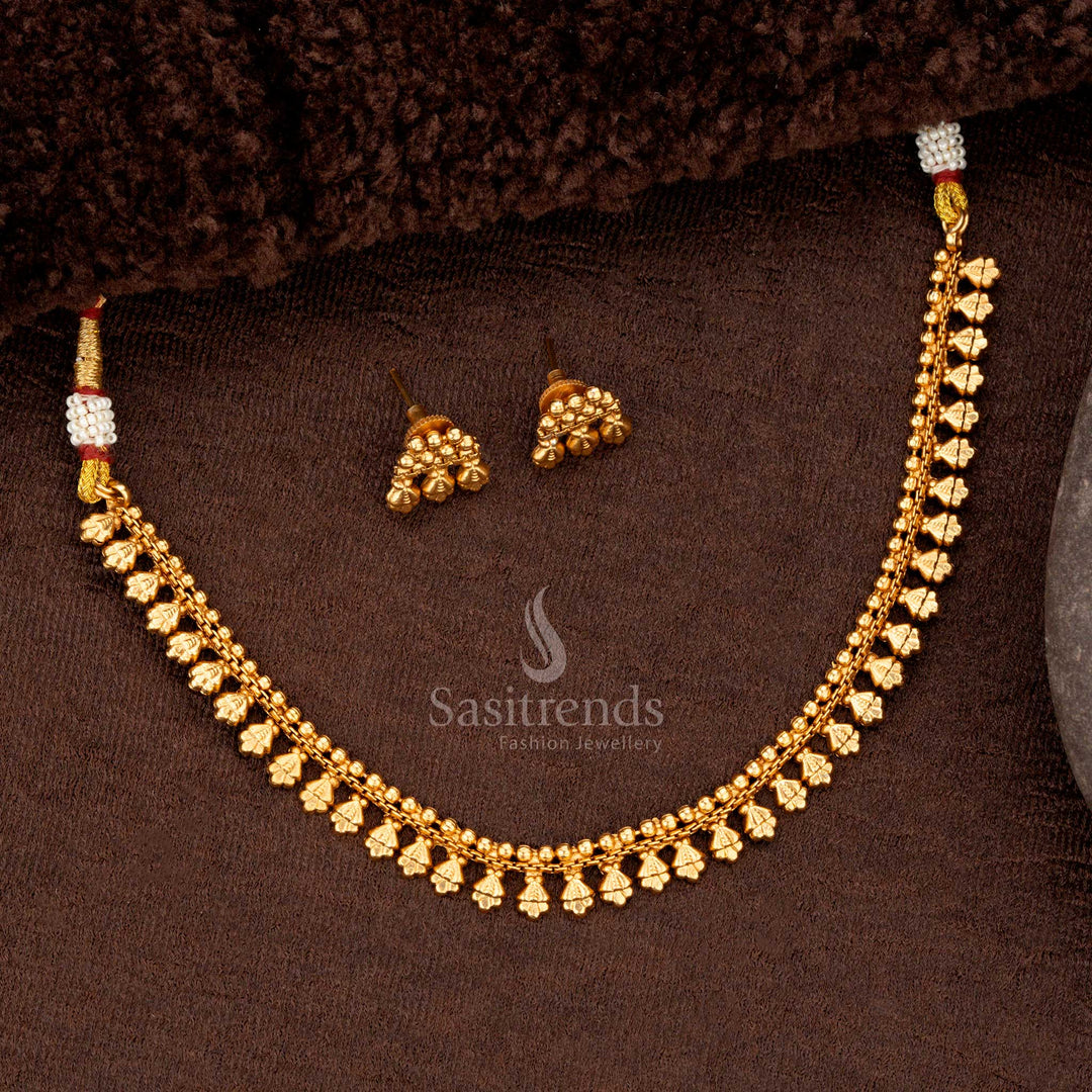 Elegant gold plated necklace set featuring a blend of floral patterns and ball designs ideal for special festive occasions - Sasitrends