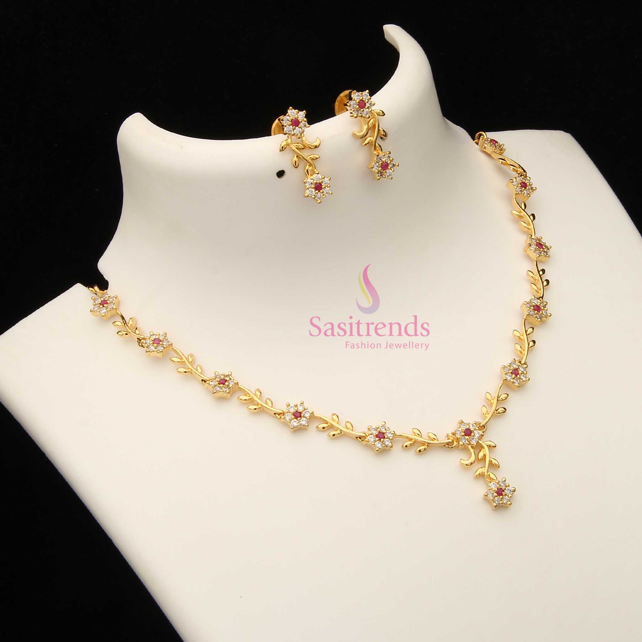 Charming white and ruby toned American Diamond floral vine necklace set with micro gold touch – a timeless pick for bridal soirees – Sasitrends